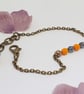 Dainty orange and blue Czech glass boho bead bracelet - Image 1