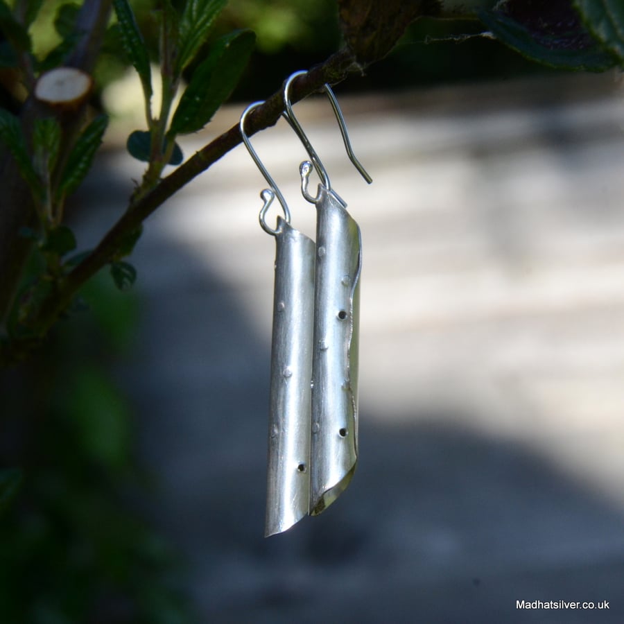 Sterling silver rolled textured statement earrings