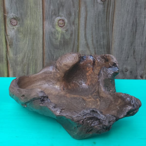 Rustic pebble-shaped wood vase