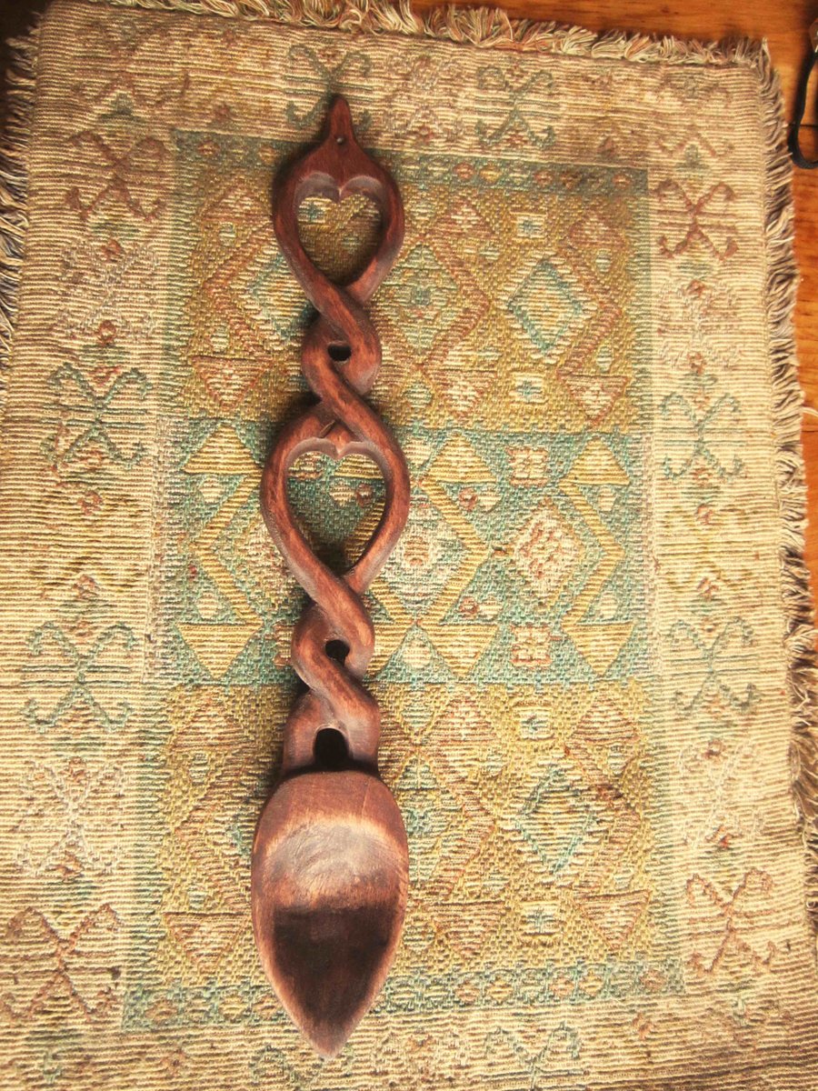 celtic interlace carved wooden lovespoon