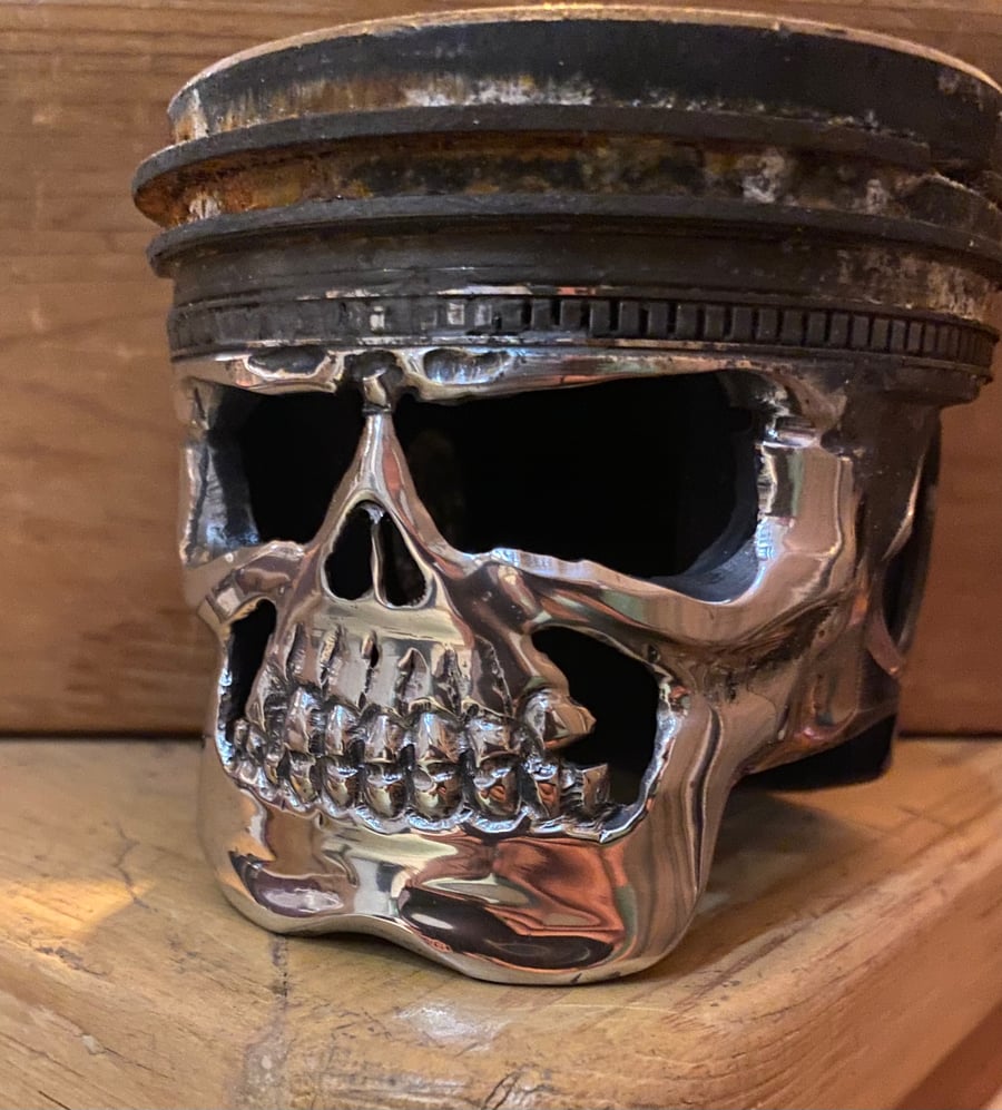 Rusty and used Chevy piston skull face with patina and original damage!