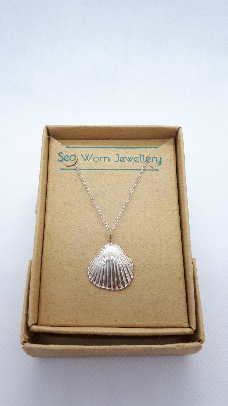 Fine silver cockle shell pendant
