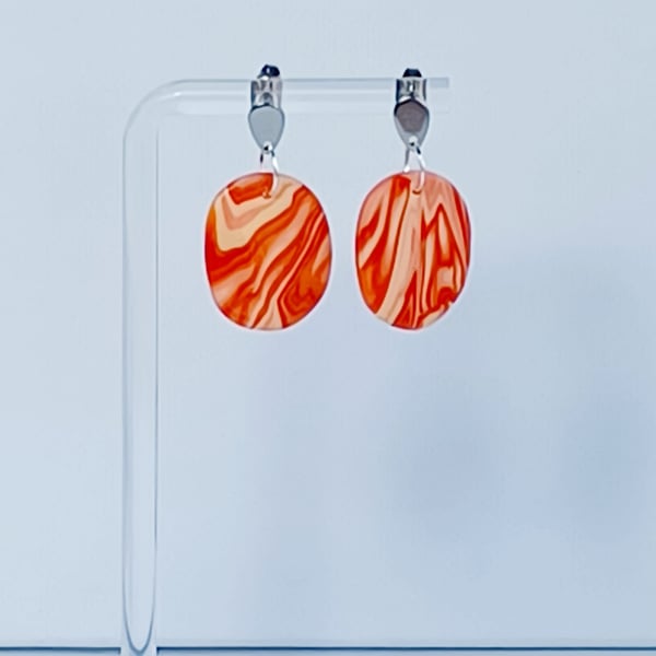 Orange marble effect polymer clay oval dangle earrings