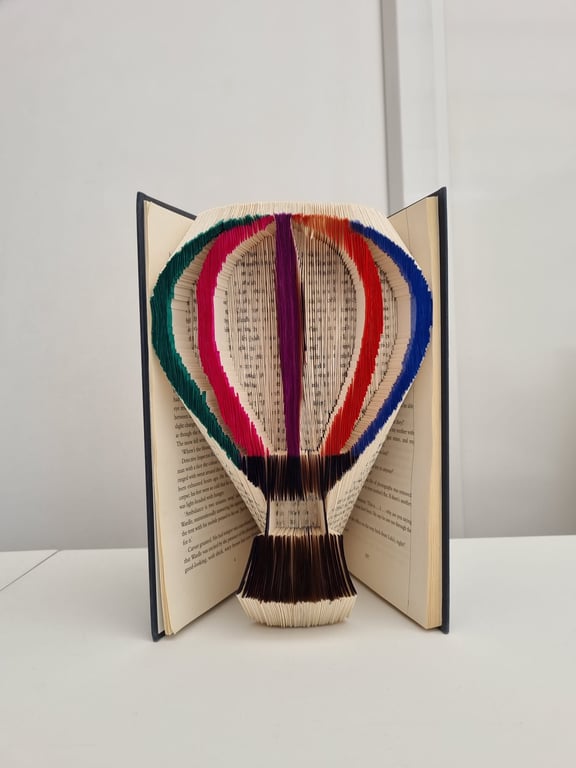 Colourful hot air balloon book art