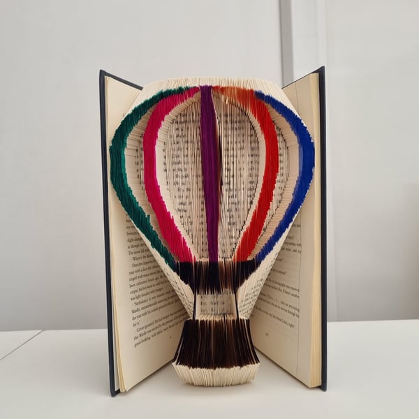 Colourful hot air balloon book art