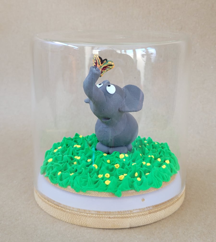 Forever fluttering by - handmade elephant ornament in a glass jar 