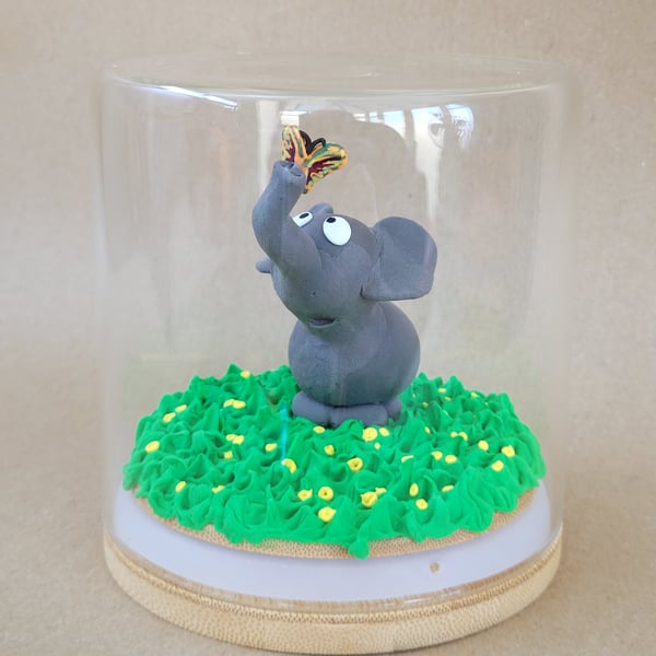 Forever fluttering by - handmade elephant ornament in a glass jar 