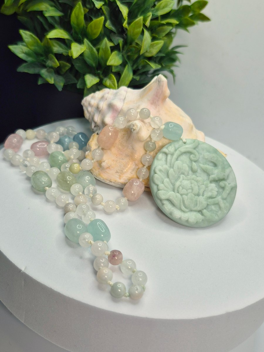 Knotted Beryl Necklace with Carved Calcite Hummingbird Pendant