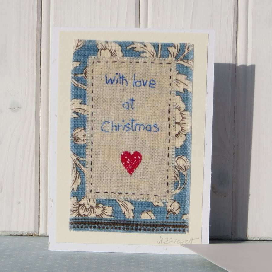 With Love at Christmas, hand-stitched text with heart, pretty background fabric