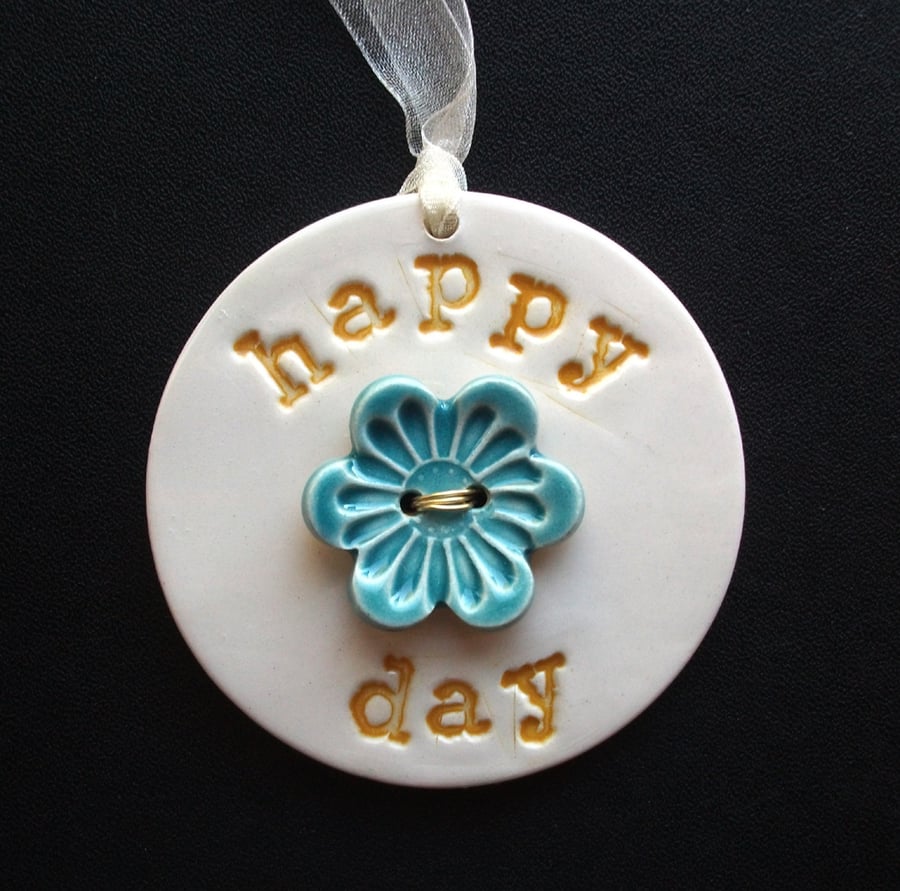 Ceramic decoration Happy Day with flower button