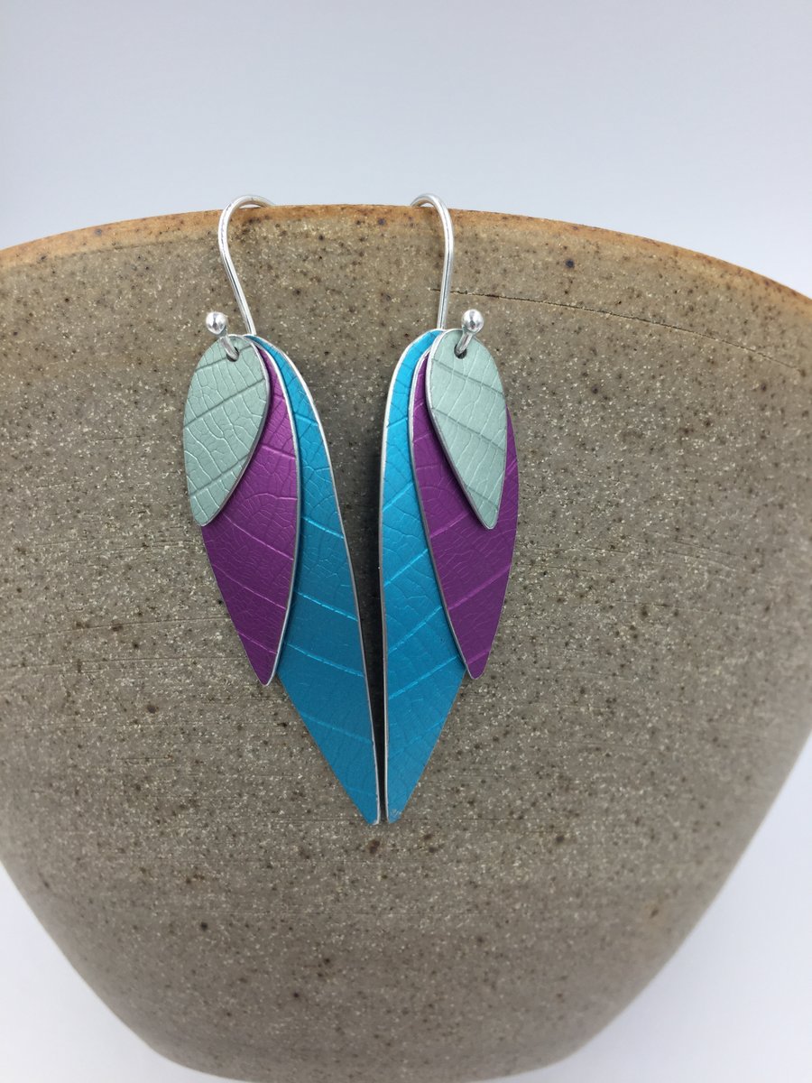 Anodised aluminium 3 layer parrot wing earrings in turquoise, pink and blue