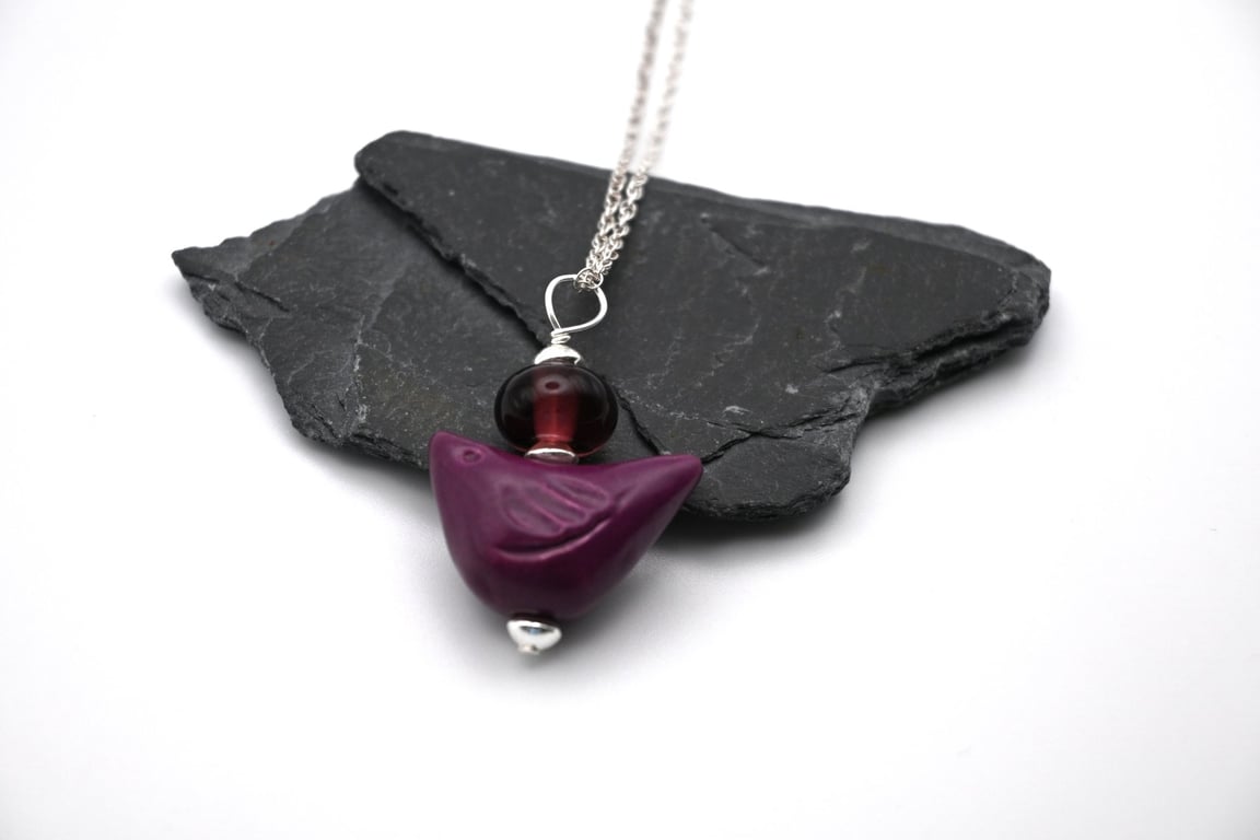 purple ceramic bird pendant necklace