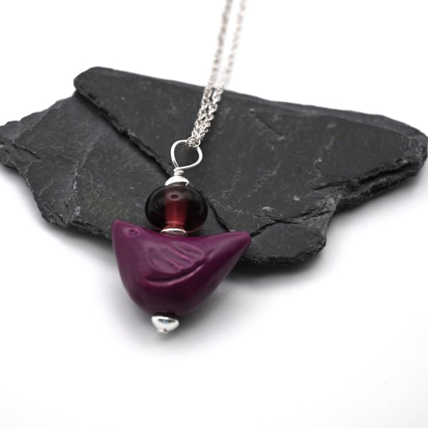 purple ceramic bird pendant necklace