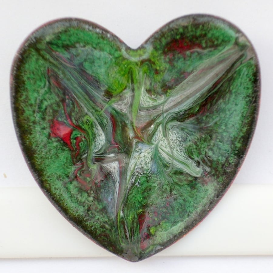 Heart shape brooch - scrolled white, red ,brown on dark green