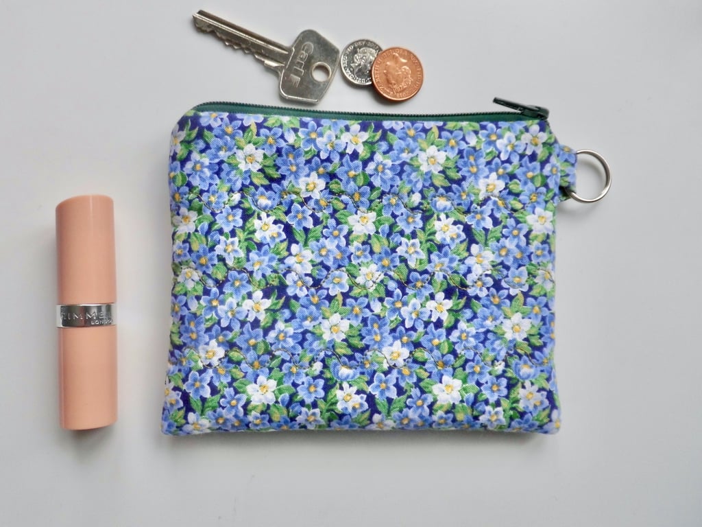 Small makeup bag or large coin purse in blue floral print