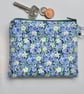 Small makeup bag or large coin purse in blue floral print