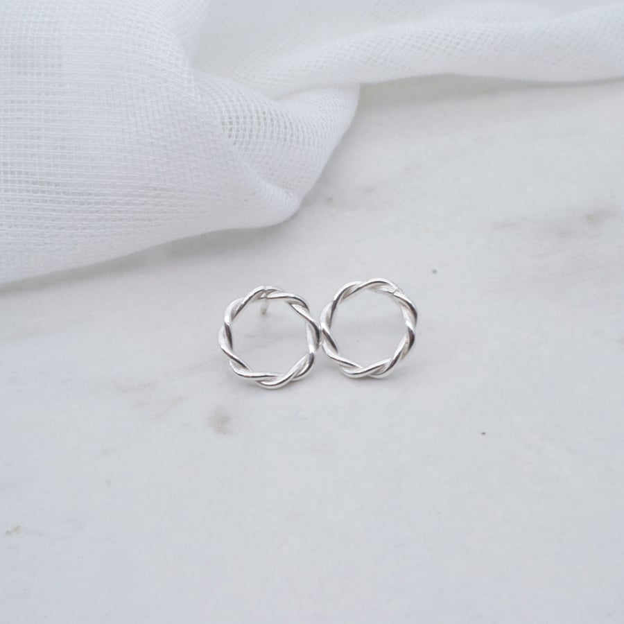 Twisted silver circle stud earrings