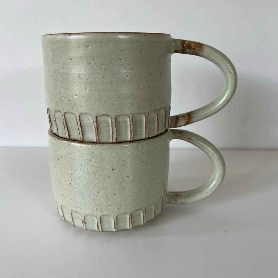 Hand thrown pottery mug in pastel green