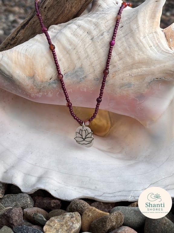 Seed beads and Agate in Burgundy with seaglass and Sterling Silver Lotus Charm