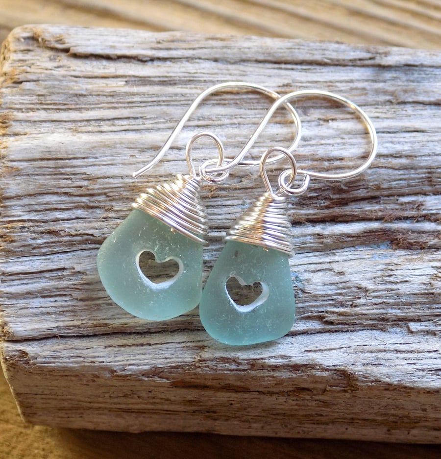 Drilled heart , wire wrapped sea glass earrings
