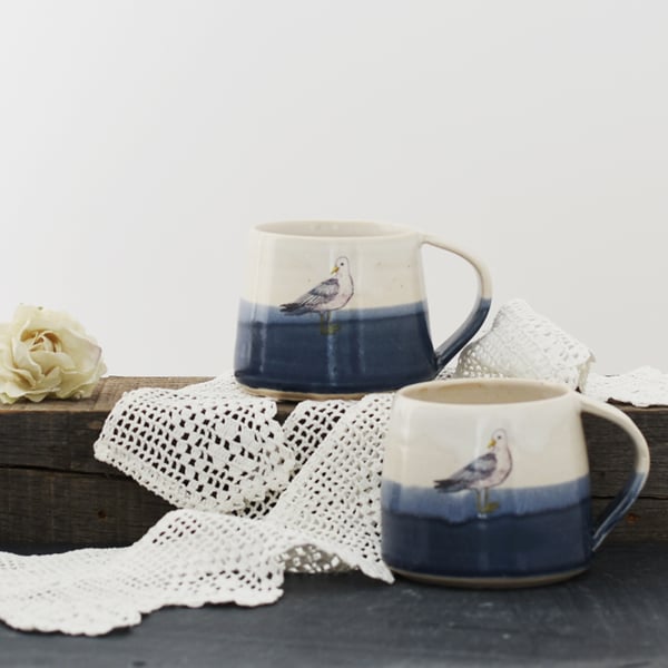 Blue and white ceramic seagull mug - handmade illustrated pottery
