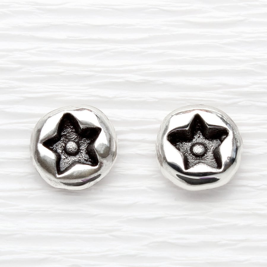Small star ear studs handmade from solid sterling silver