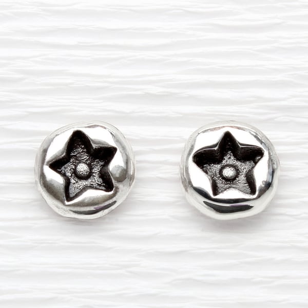 Small star ear studs handmade from solid sterling silver