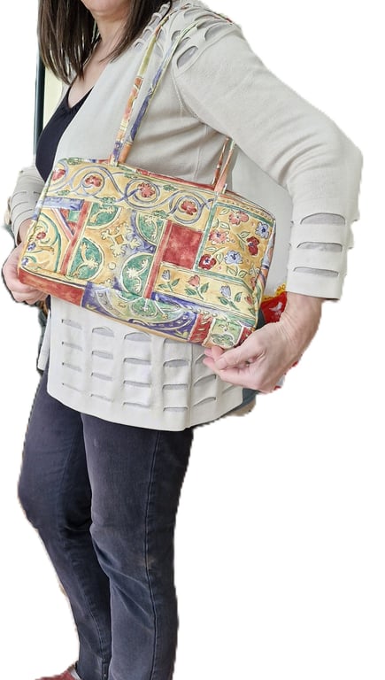 Large lemon patterned bowling style travel bag with key chain and wide opening