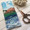 Embroidered seascape bookmark.