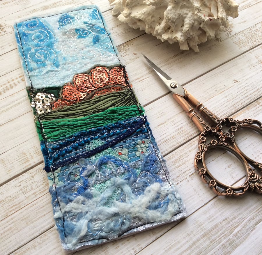 Embroidered seascape bookmark.