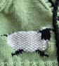 Green baby cardigan with sheep designs on the front - Image 5