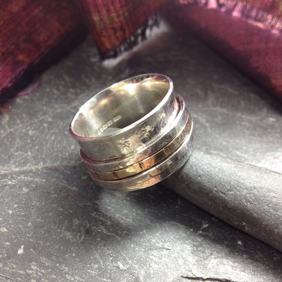 Wide silver and gold spinner ring