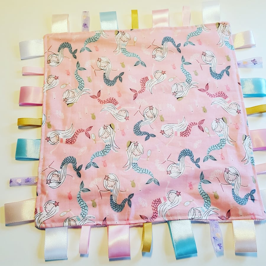 Pink mermaid taggy blanket 