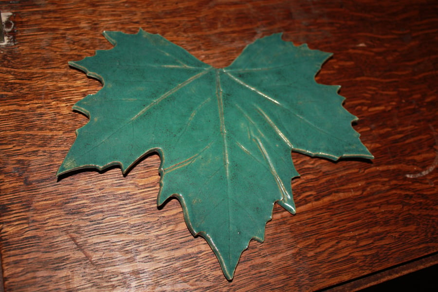 Handmade ceramic glazed green leaf decoration 