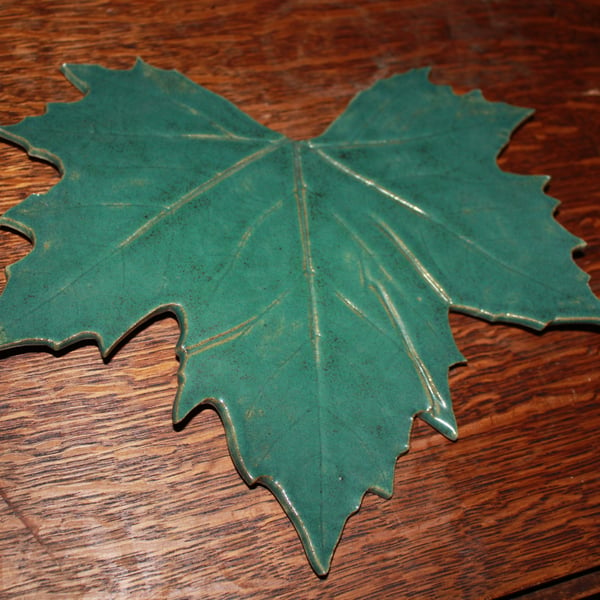 Handmade ceramic glazed green leaf decoration 