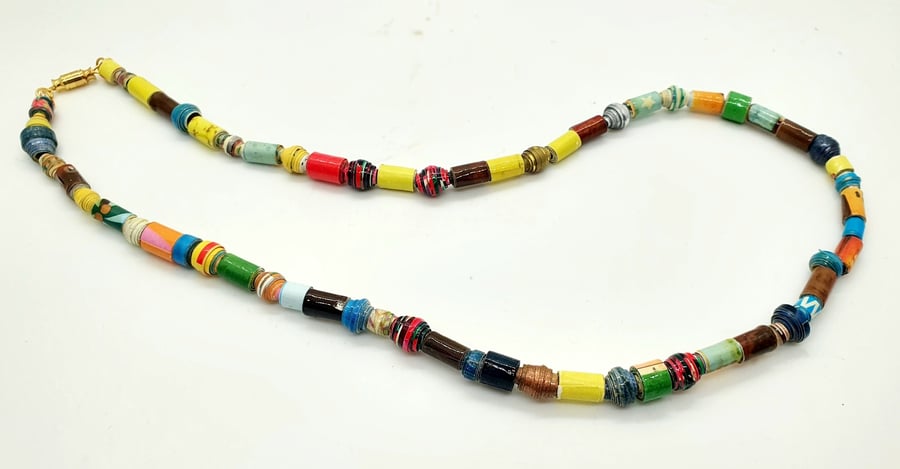 Multicoloured necklace made of a variety of small paper beads