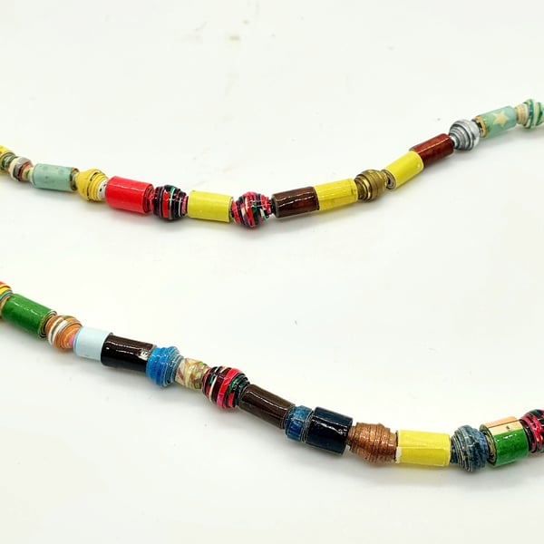 Multicoloured necklace made of a variety of small paper beads