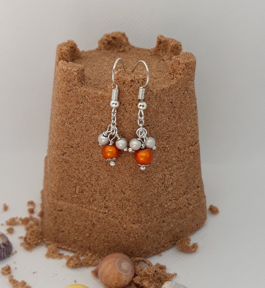 ER13 orange and silver miracle bead drops
