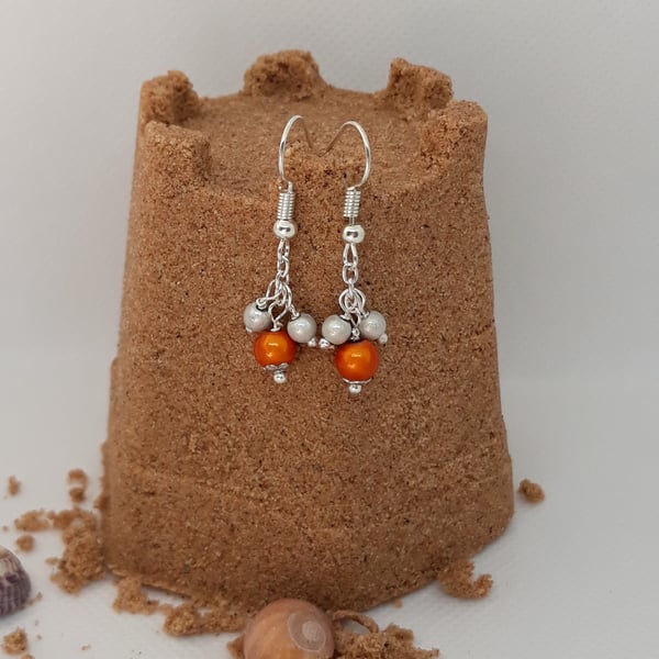 ER13 orange and silver miracle bead drops