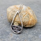 Silver teardrop sun rising over the sea pendant