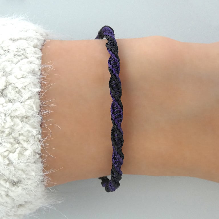 Adjustable 7" black and purple two tone bracelet for women.                    