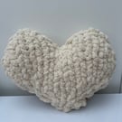 Hand knitted heart cushion