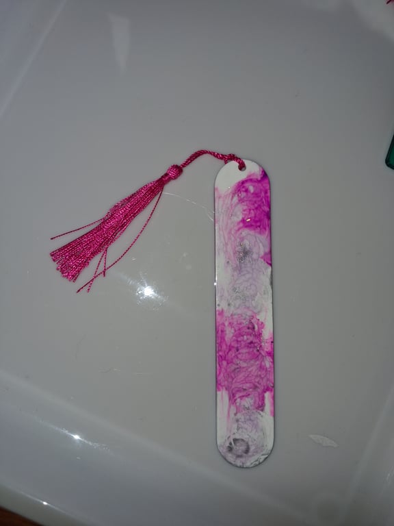 Handmade pink and white epoxy resin bookmark