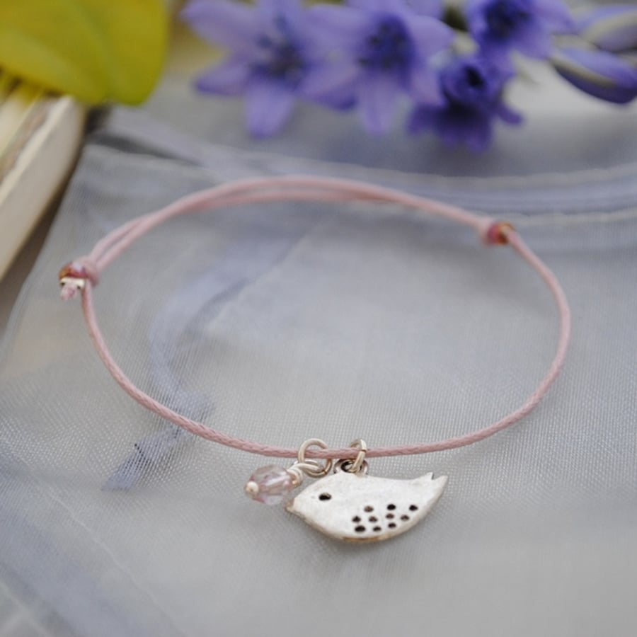 Friendship Bracelet-Pink cord with silver bird 