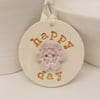 Ceramic decoration Happy Day with flower button
