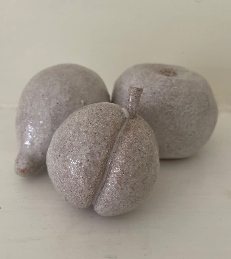 Hand modelled stoneware fruit