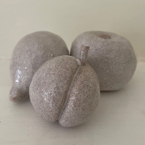 Hand modelled stoneware fruit