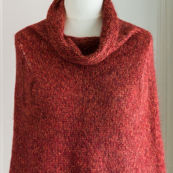 This cape is a super soft and warm capelet or poncho, hand knit and seamless