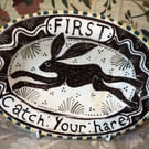 Oval slip ware dish with hand painted hare
