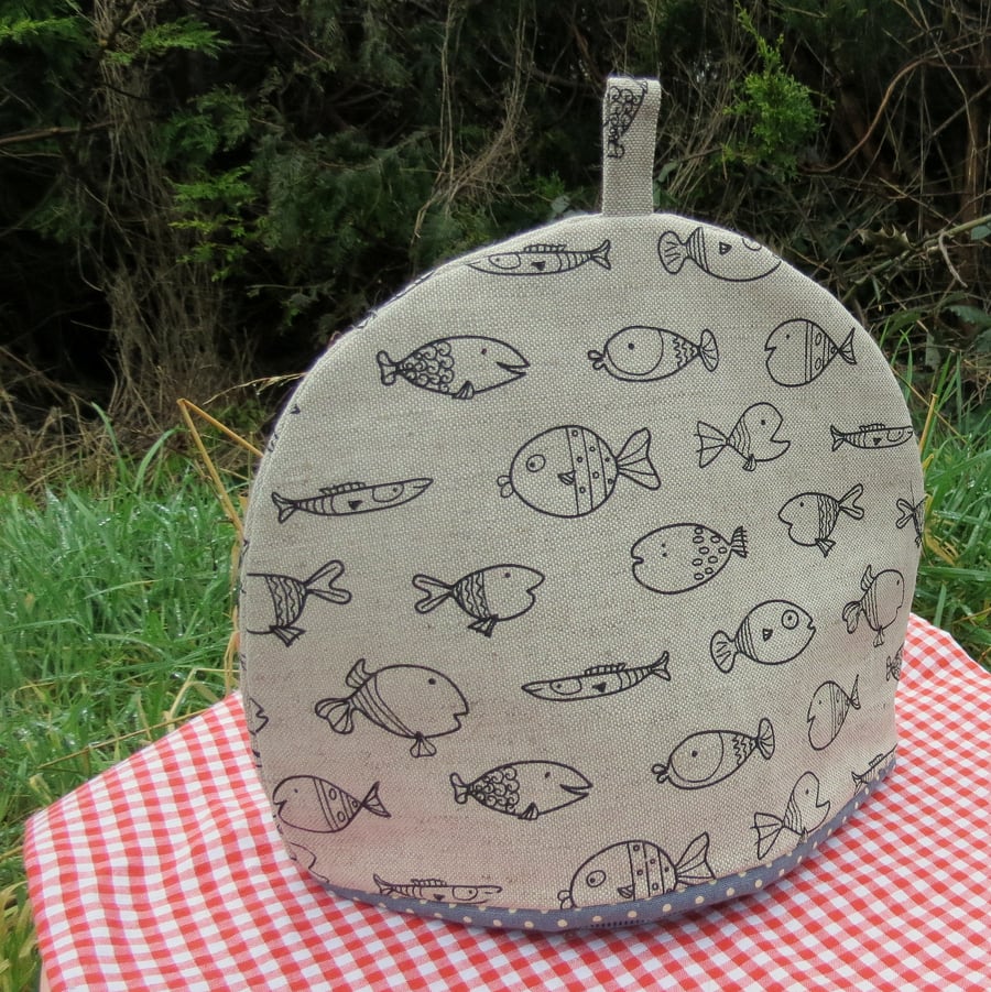 Fish.  A tea cosy, size medium.  To fit a 4 cup teapot.  